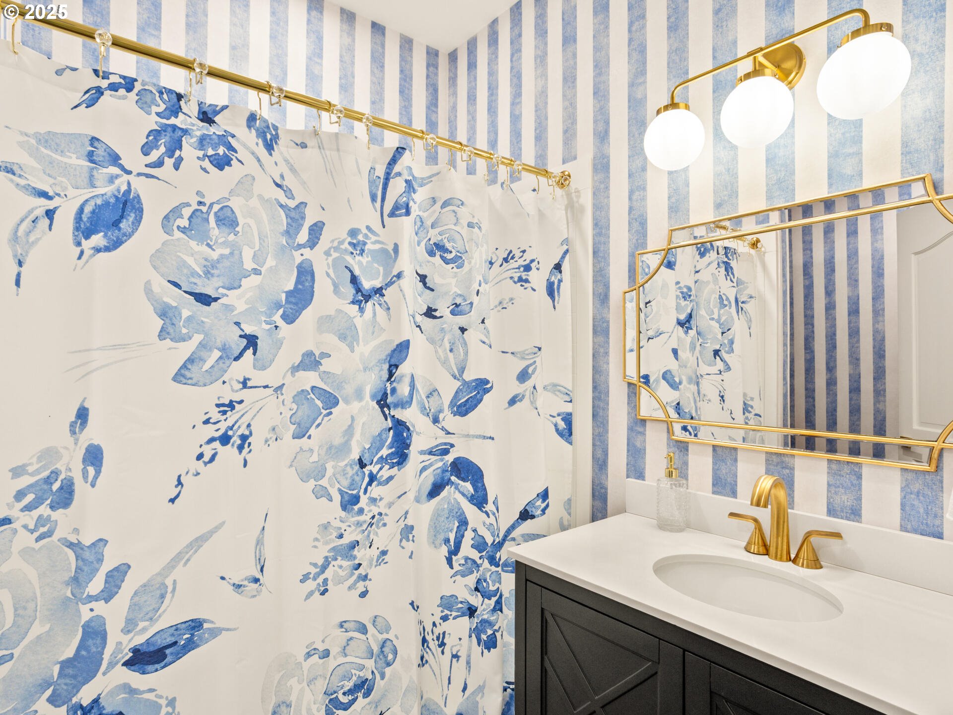 23751 Schultz Road Northeast Aurora, OR 97002 - Photo 23 of 48 a bathroom with a sink and a mirror