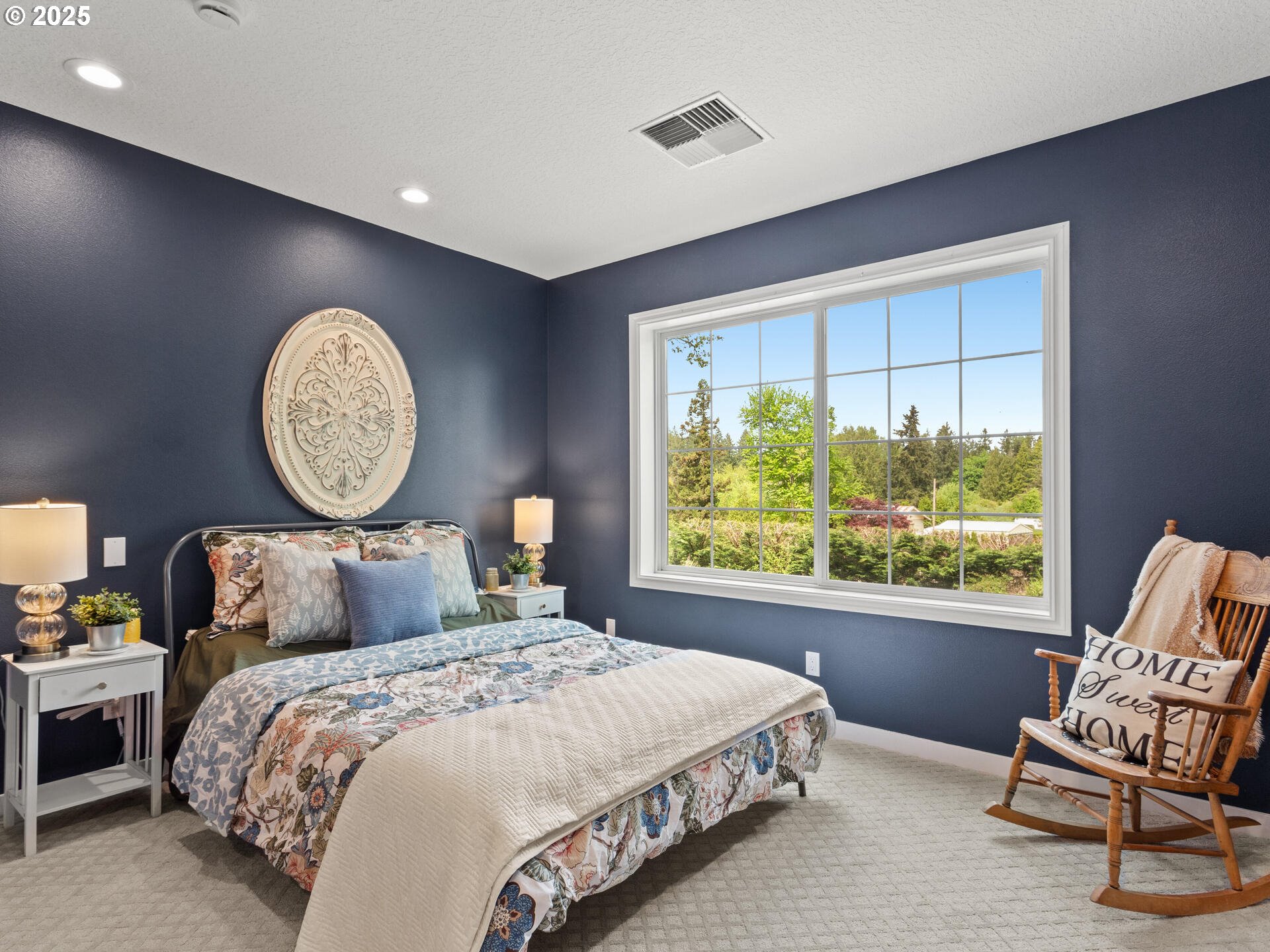 23751 Schultz Road Northeast Aurora, OR 97002 - Photo 27 of 48 a bedroom with a bed and a large window