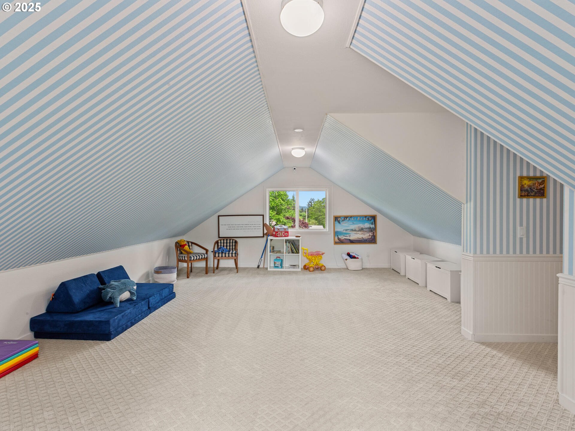 23751 Schultz Road Northeast Aurora, OR 97002 - Photo 30 of 48 a view of a livingroom with a chair and white cabinets