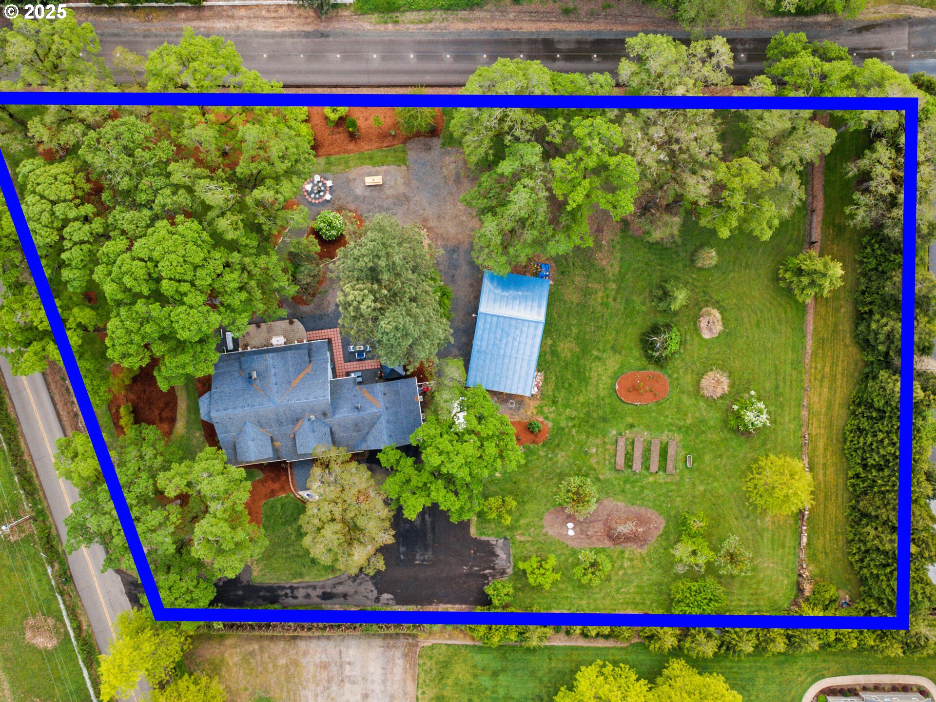 23751 Schultz Road Northeast Aurora, OR 97002 - Photo 41 of 48 a view of swimming pool with a yard and plants