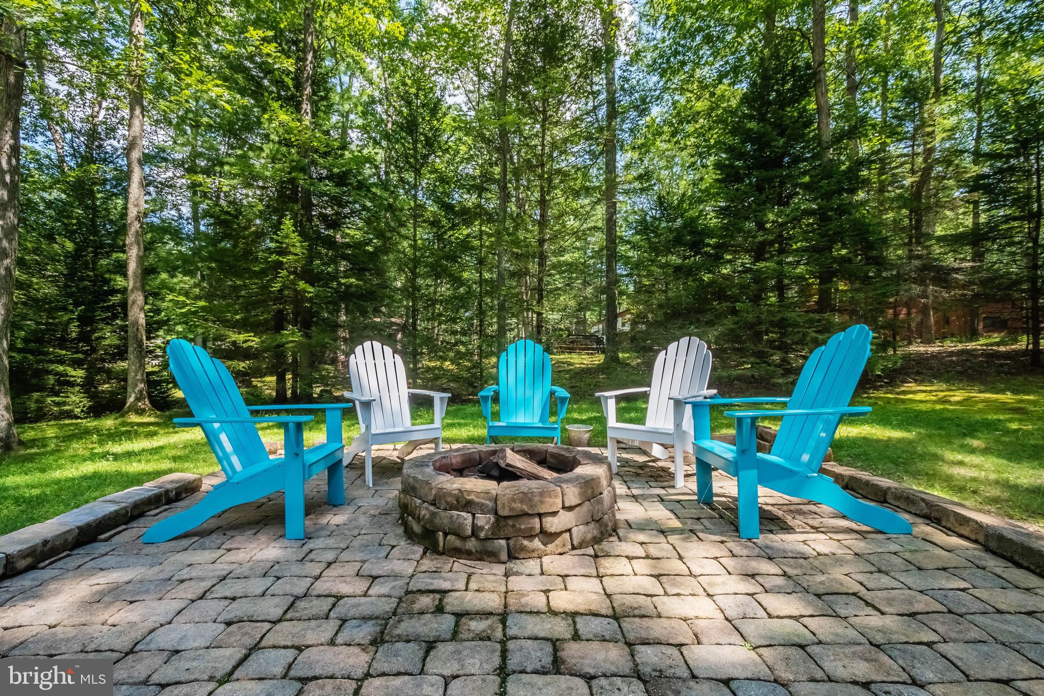 302 Oak Way Road Swanton, MD 21561 - Photo 45 of 56 a backyard of a house with outdoor seating