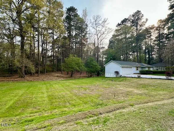 a fire hydrant in the middle of a field