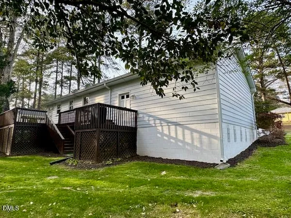 a view of backyard with deck