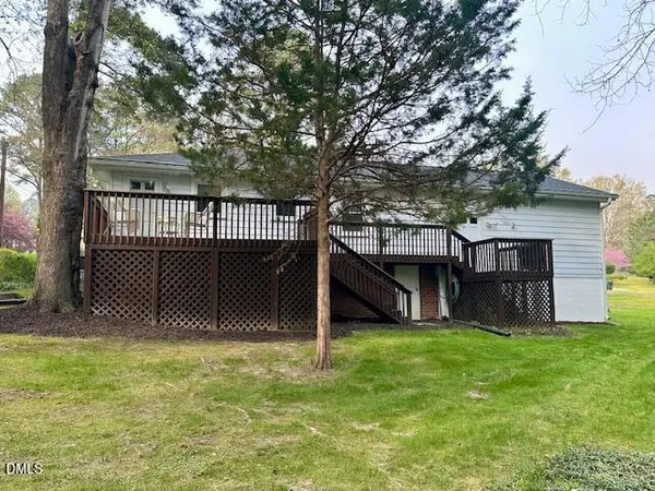 a view of a house with a back yard