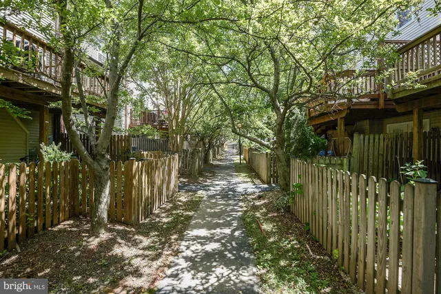 a view of balcony with wooden floor