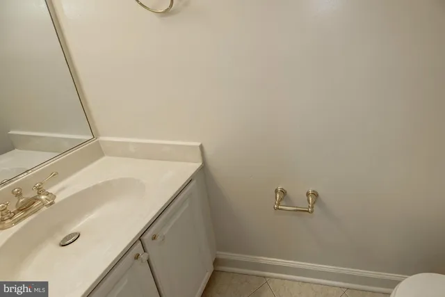 a bathroom with a sink and a vanity