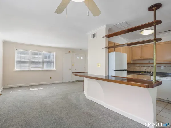 a view of a kitchen with a sink