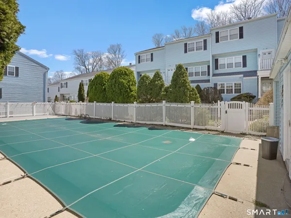 a view of a building with a yard