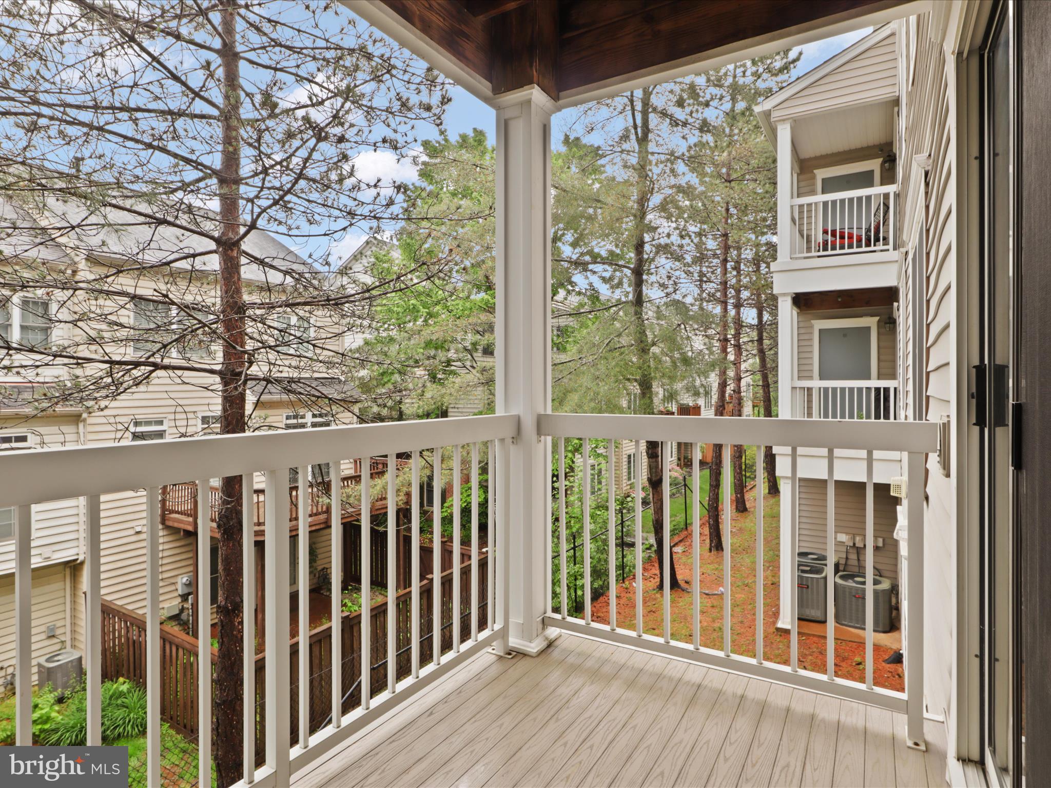 4574 Superior Square Fairfax, VA 22033 - Photo 12 of 44 a view of a balcony with wooden floor
