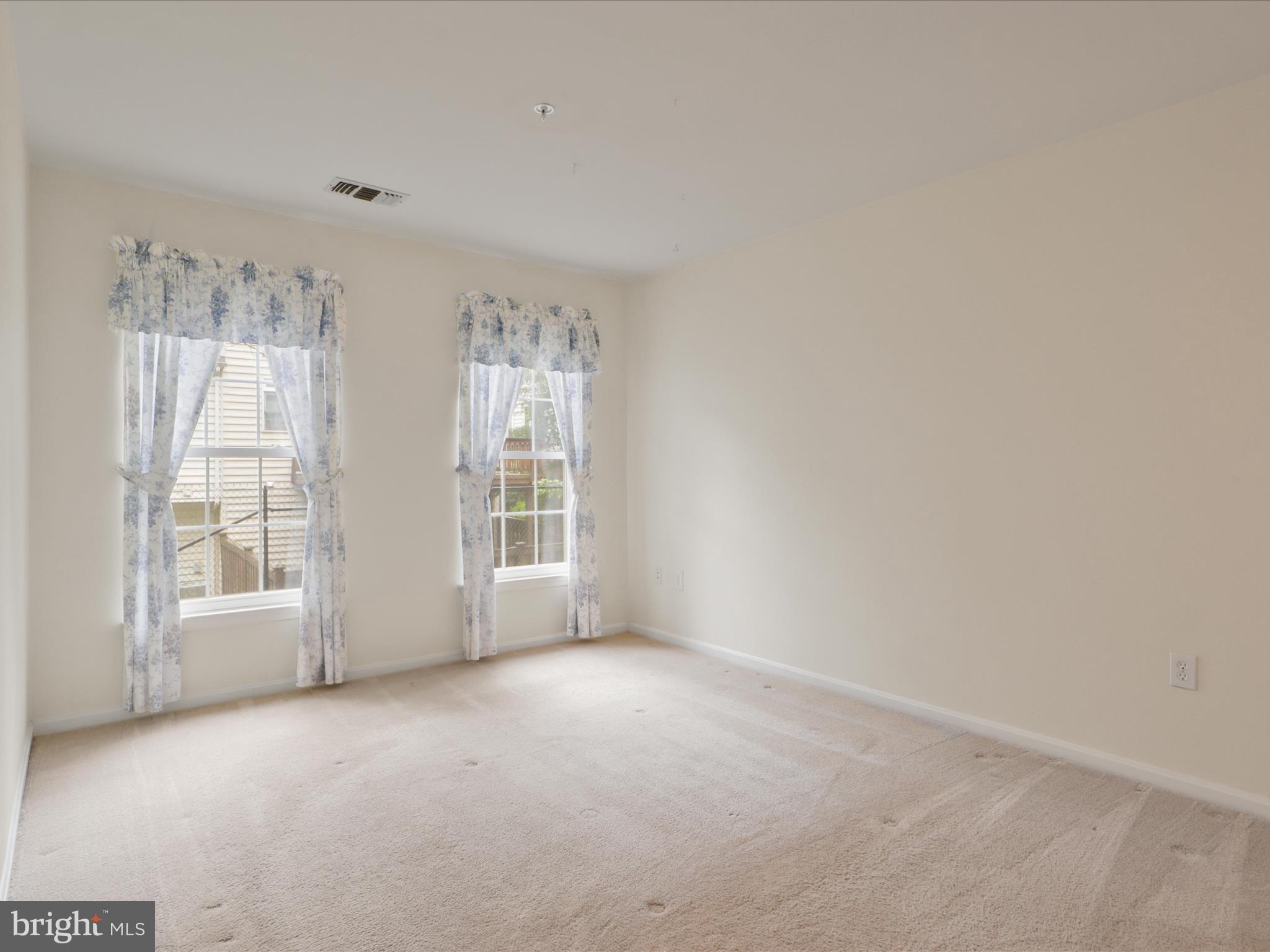 4574 Superior Square Fairfax, VA 22033 - Photo 20 of 44 a view of an empty room with a window
