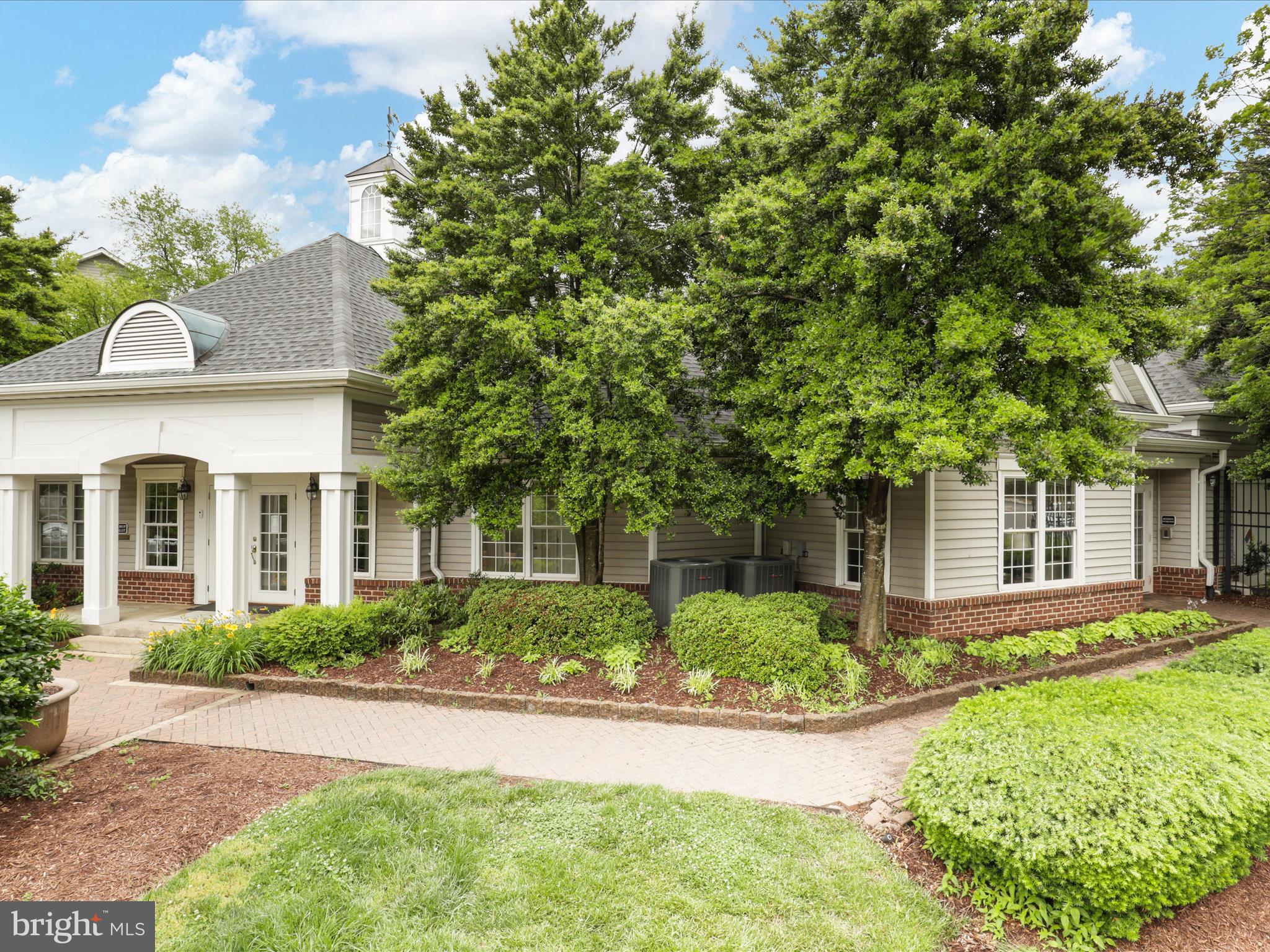 4574 Superior Square Fairfax, VA 22033 - Photo 32 of 44 front view of a house with a yard