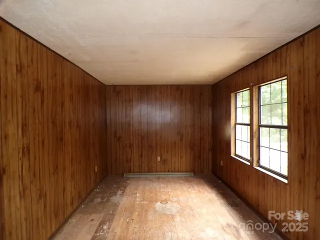 an empty room with windows