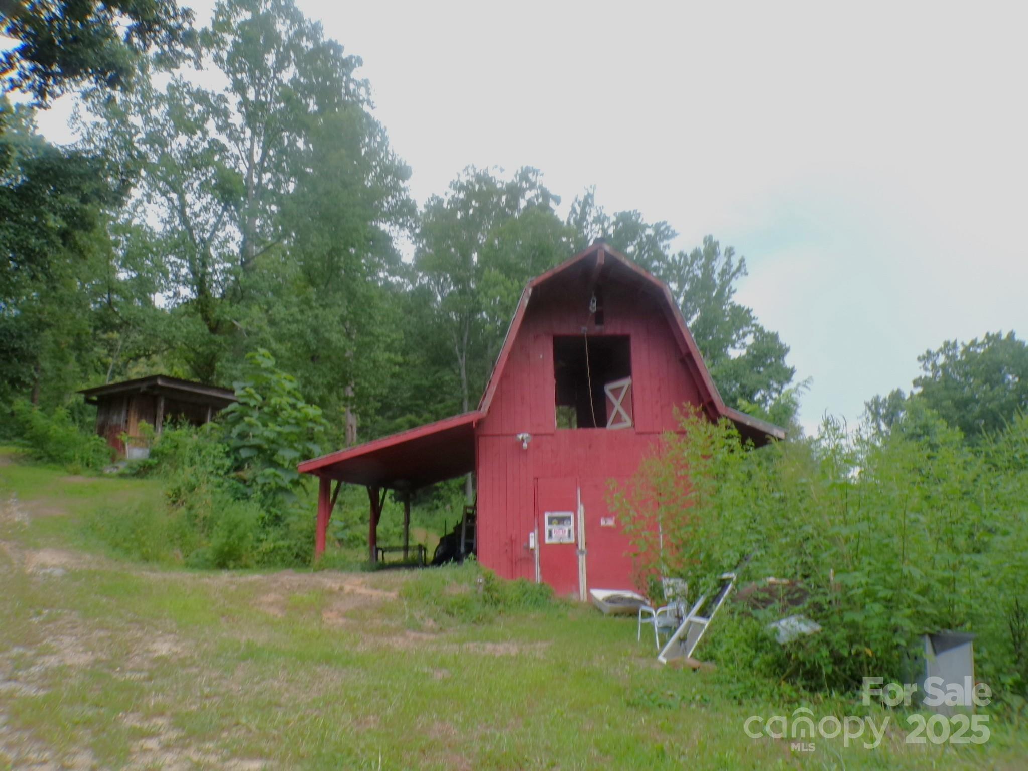 620 Hutch Mountain Road Fletcher, NC 28732 - Photo 3 of 22 a aerial view of a house