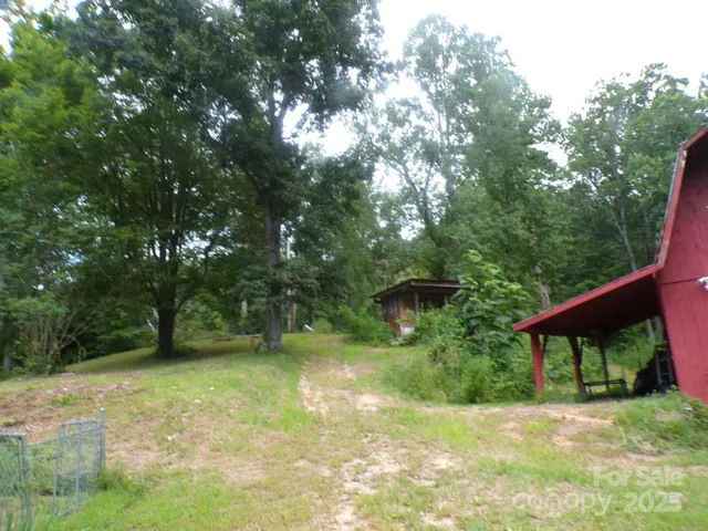 a view of backyard with green space
