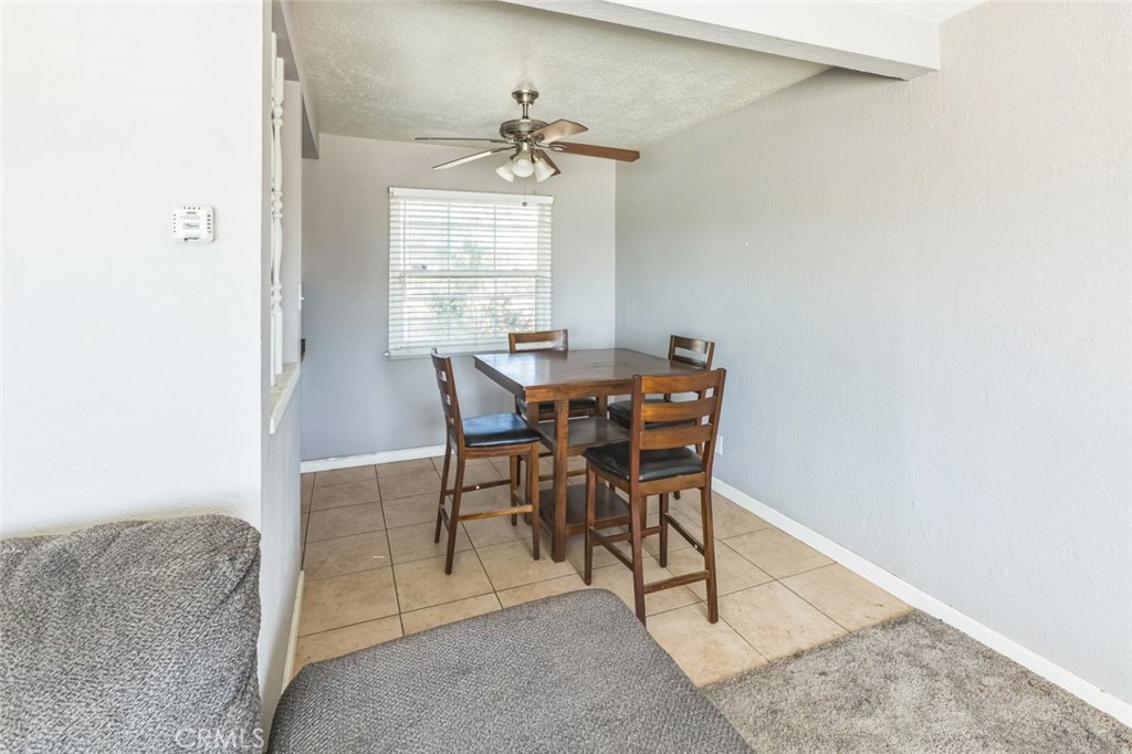 15917 Lee Street Mojave, CA 93501 - Photo 12 of 34 a view of a dining room with furniture and window