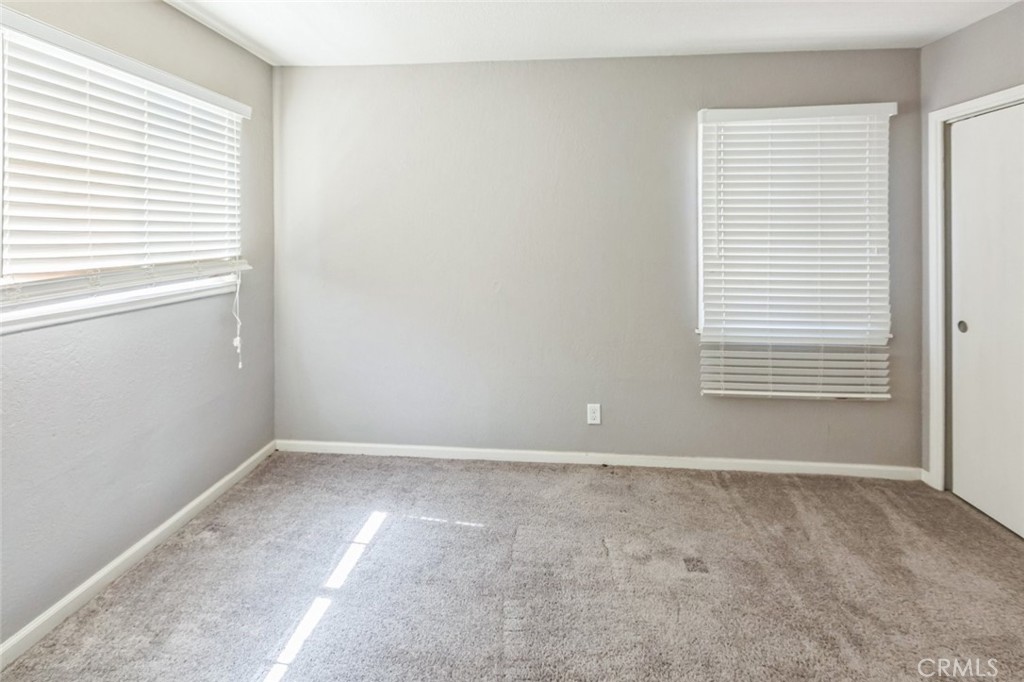 15917 Lee Street Mojave, CA 93501 - Photo 20 of 34 a view of an empty room with a window