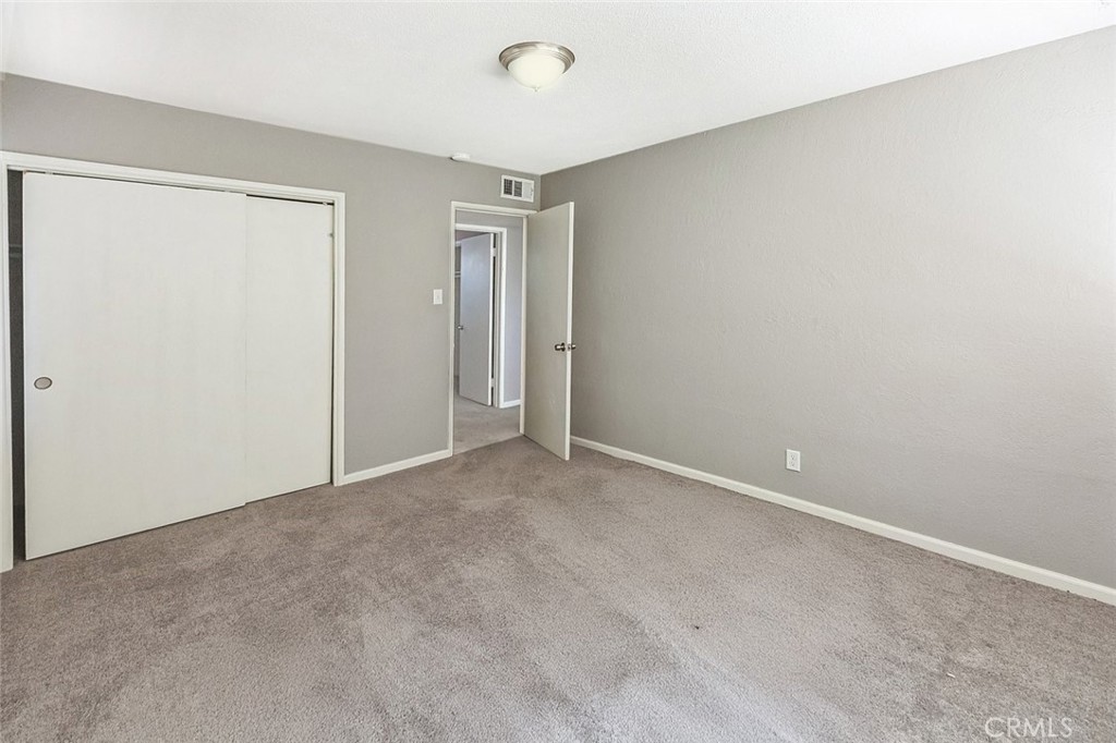 15917 Lee Street Mojave, CA 93501 - Photo 28 of 34 a view of an empty room and a window