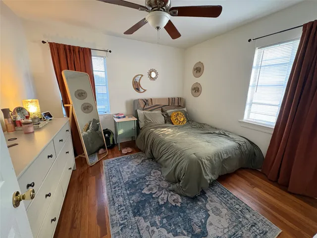 a bed room with a bed and a window