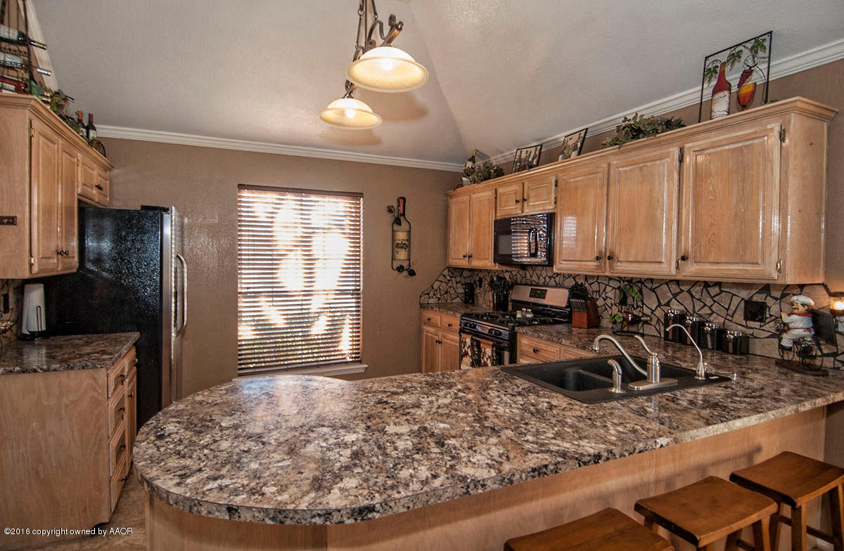 7508 Sheldon Road Amarillo, TX 79119 - Photo 8 of 39 KITCHEN VIEW 2