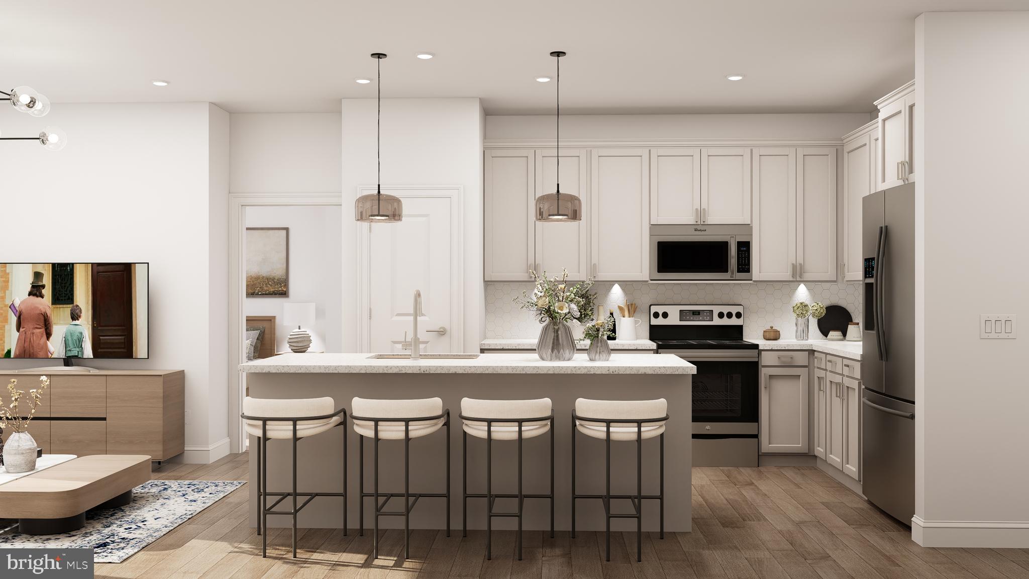 a kitchen with a stove a sink and a refrigerator