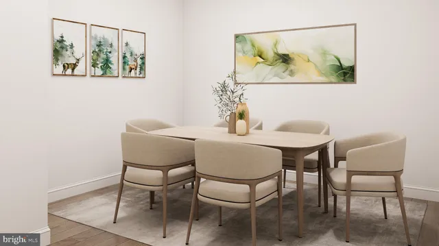 a dining room with furniture and wooden floor