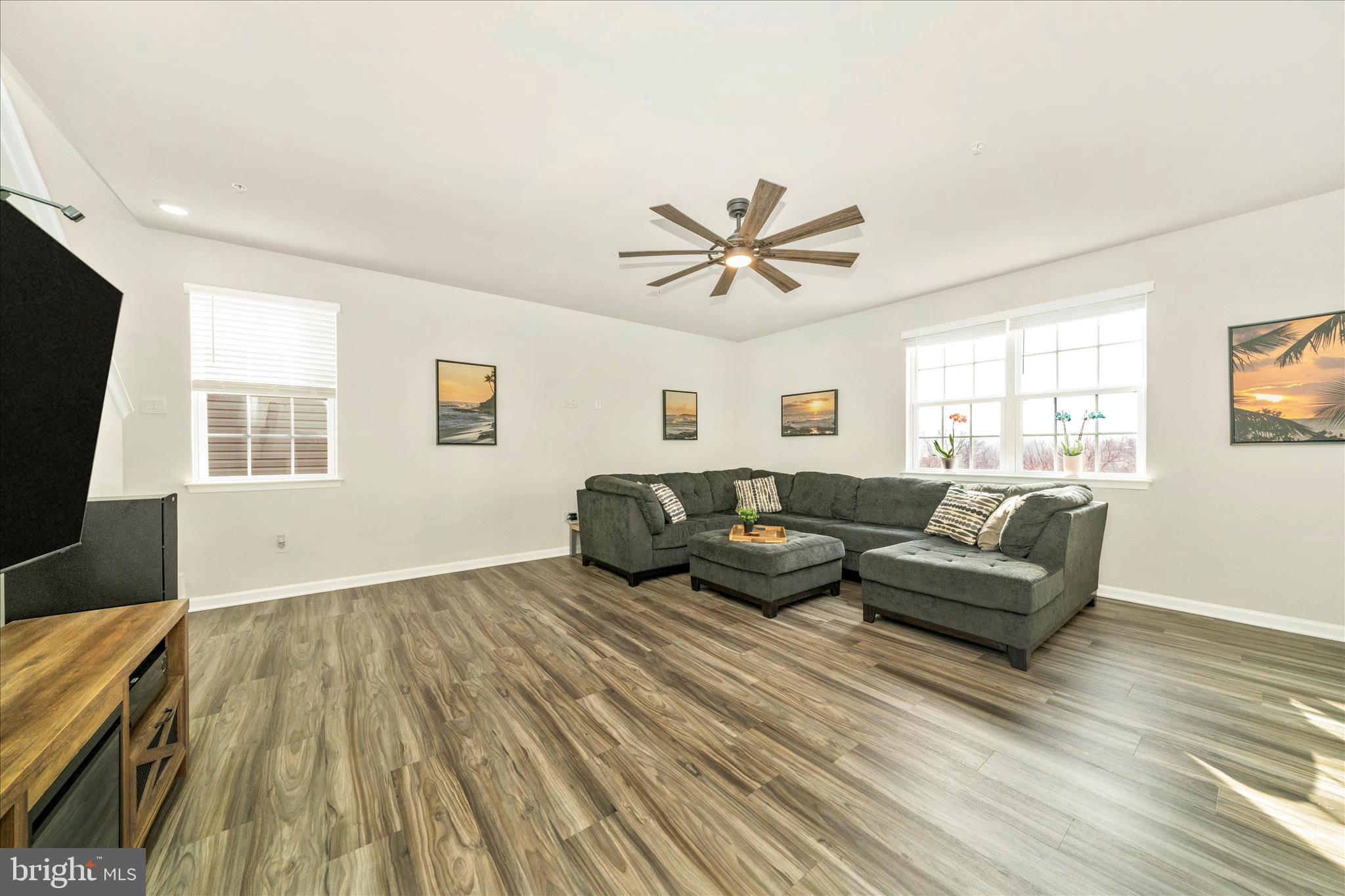 2086 Pomona Way Frederick, MD 21702 - Photo 11 of 77 a living room with furniture and a flat screen tv