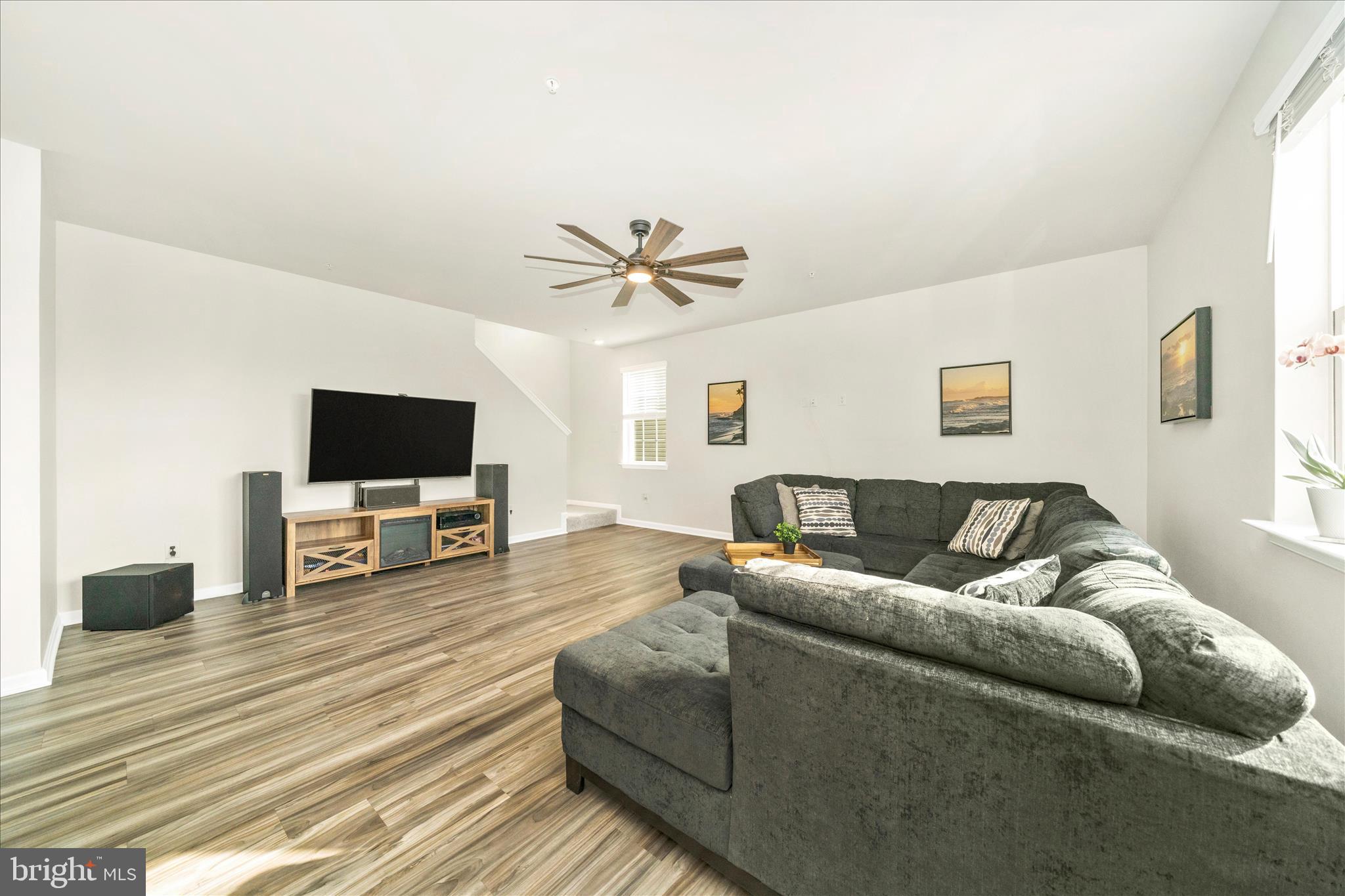2086 Pomona Way Frederick, MD 21702 - Photo 12 of 77 a living room with furniture and a flat screen tv