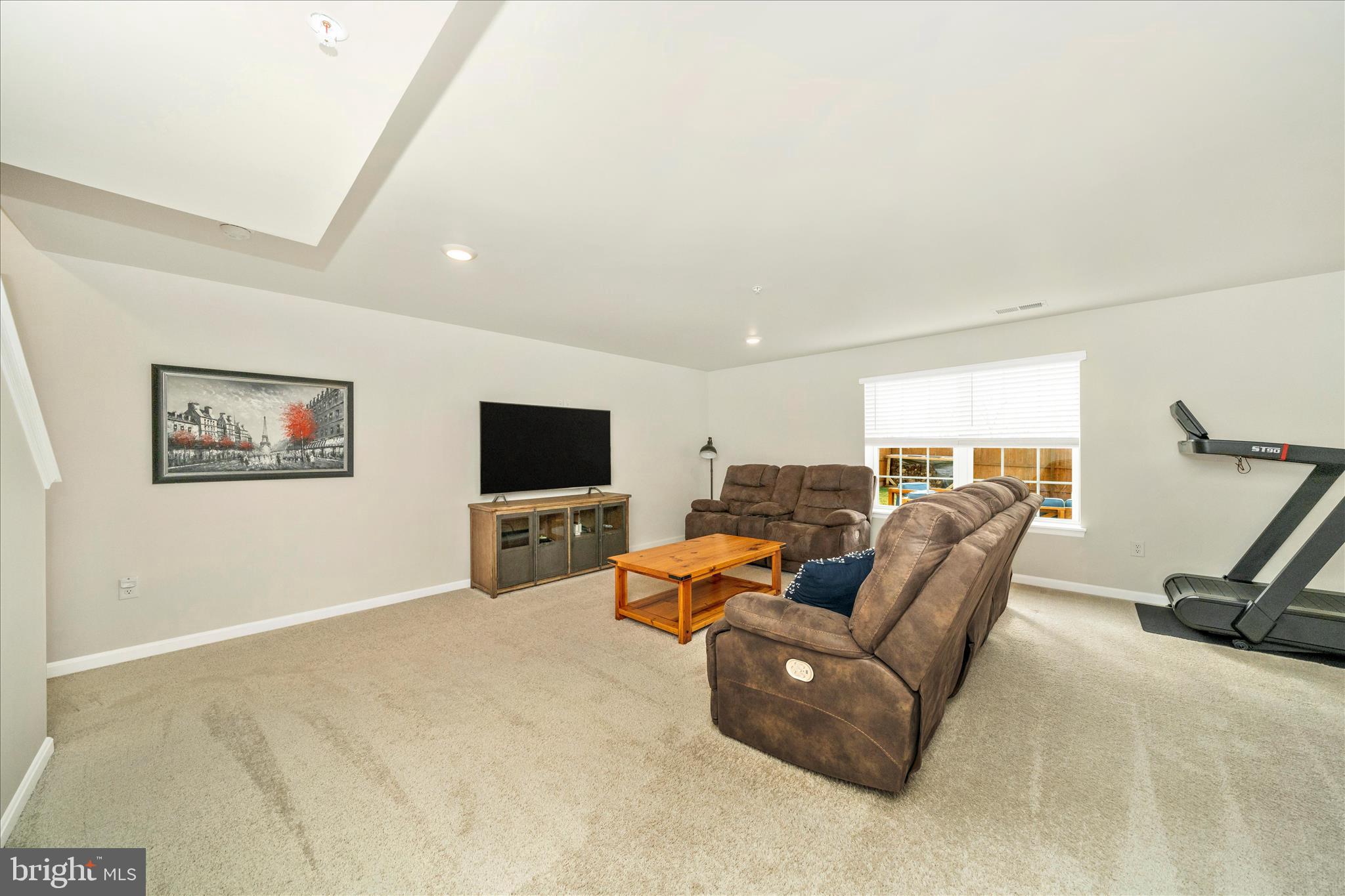 2086 Pomona Way Frederick, MD 21702 - Photo 30 of 77 a living room with furniture and a flat screen tv