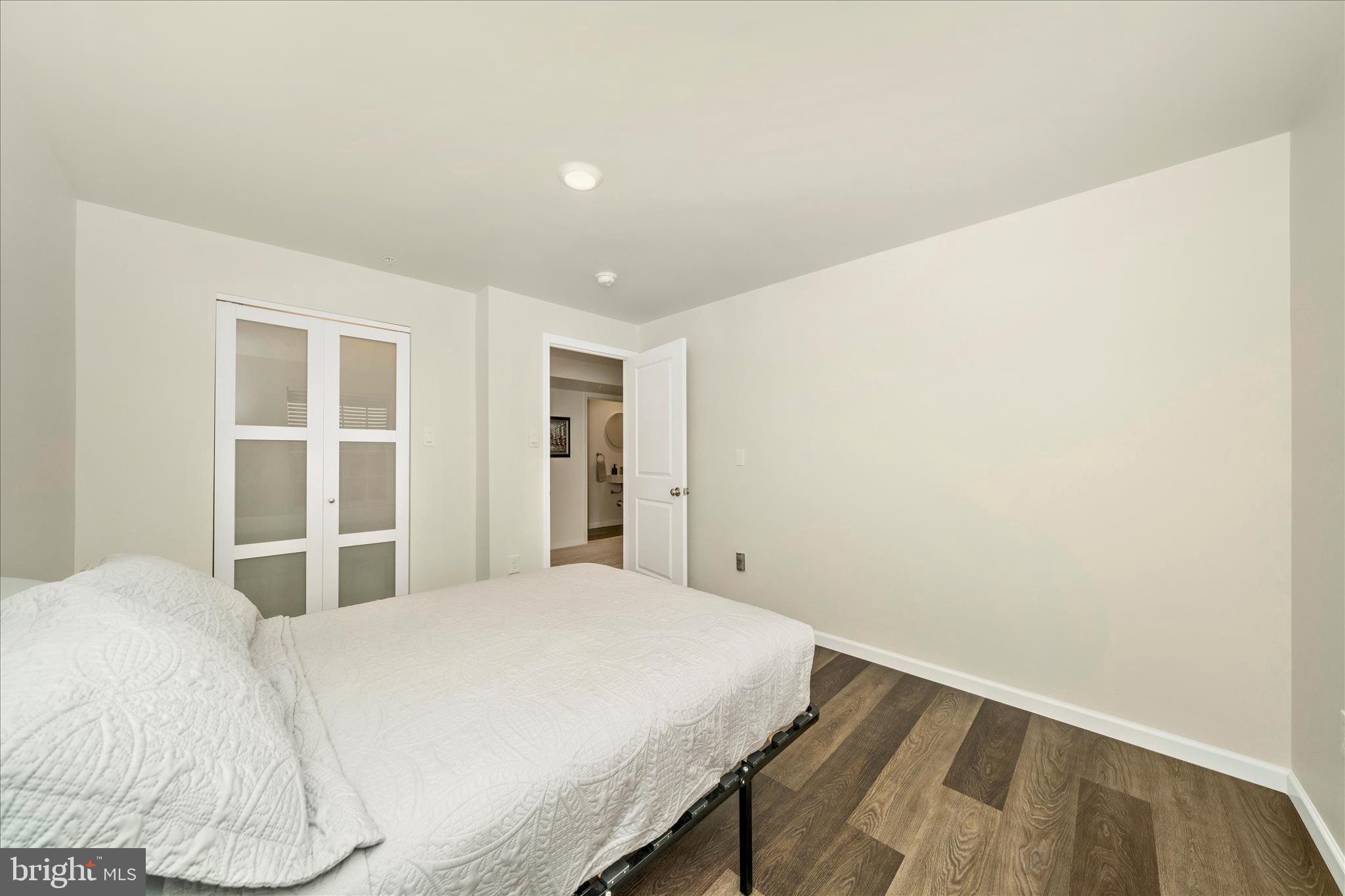 2086 Pomona Way Frederick, MD 21702 - Photo 35 of 77 a bedroom with a bed and a window