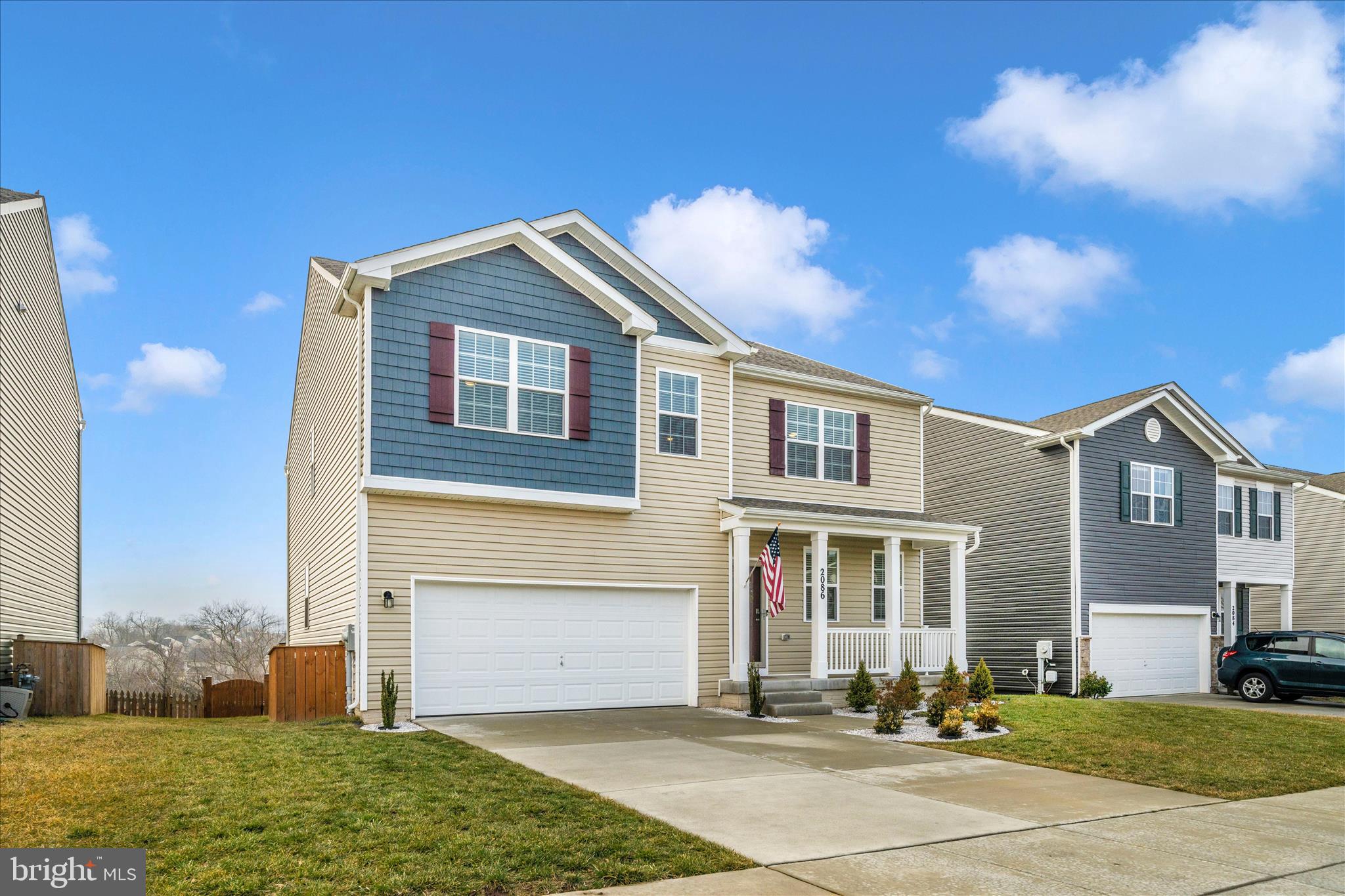 2086 Pomona Way Frederick, MD 21702 - Photo 48 of 77 a front view of a house with a yard