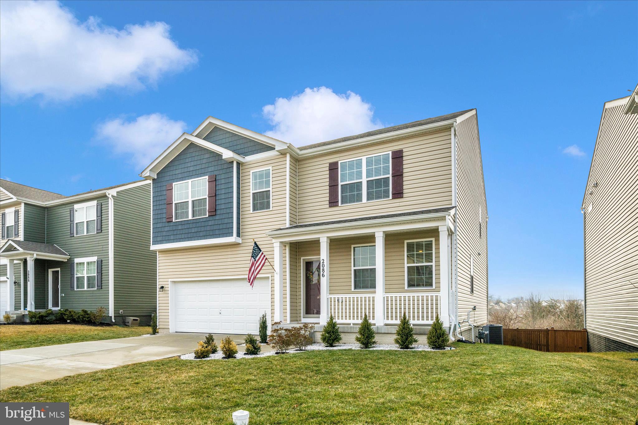 2086 Pomona Way Frederick, MD 21702 - Photo 49 of 77 a front view of a house with a yard