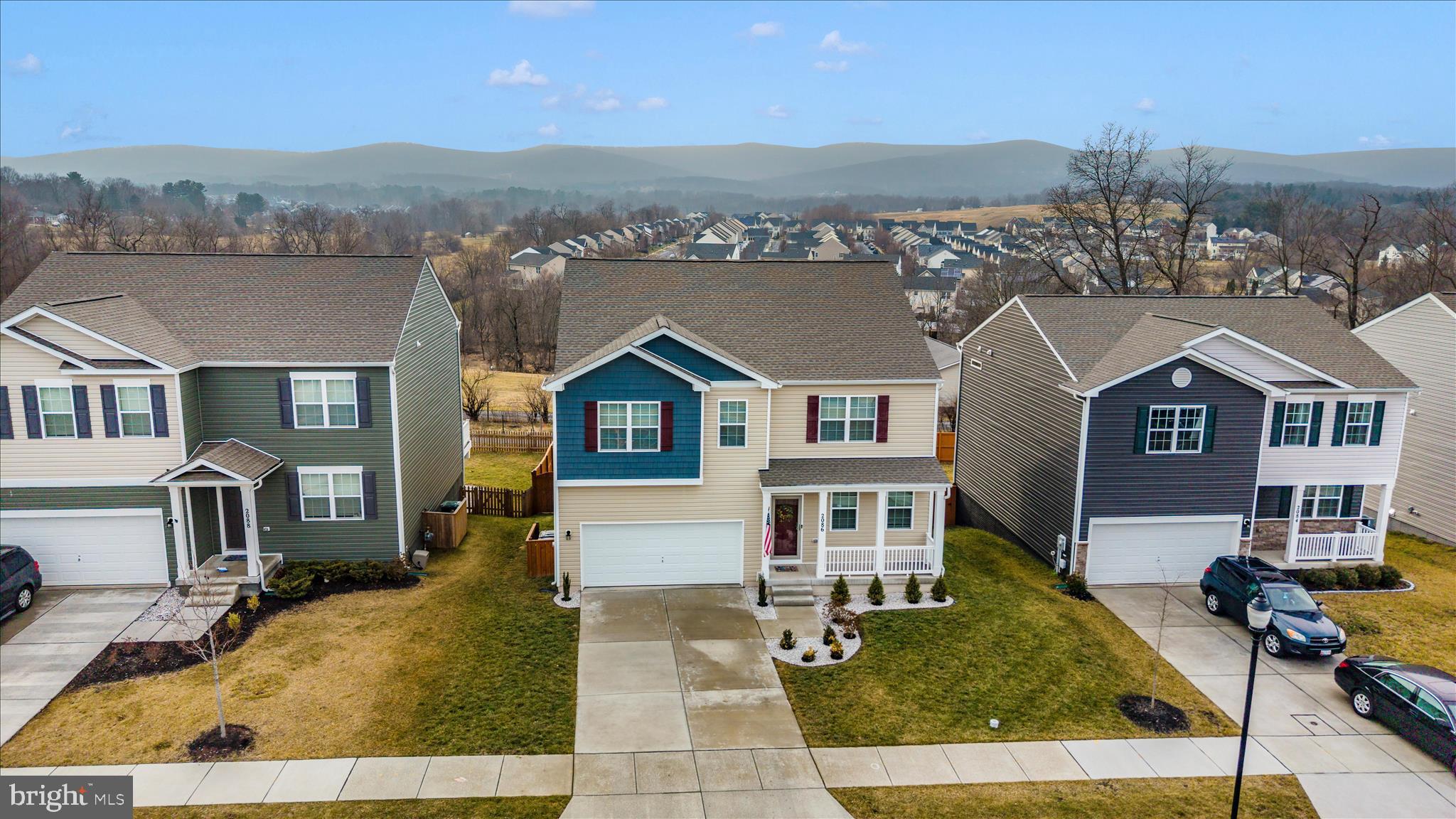 2086 Pomona Way Frederick, MD 21702 - Photo 52 of 77 an aerial view of a house with a yard