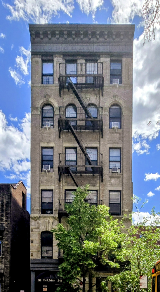 248 East 3rd Street, Unit 3B Manhattan, NY 10009 - Photo 10 of 11 a front view of a house with a yard