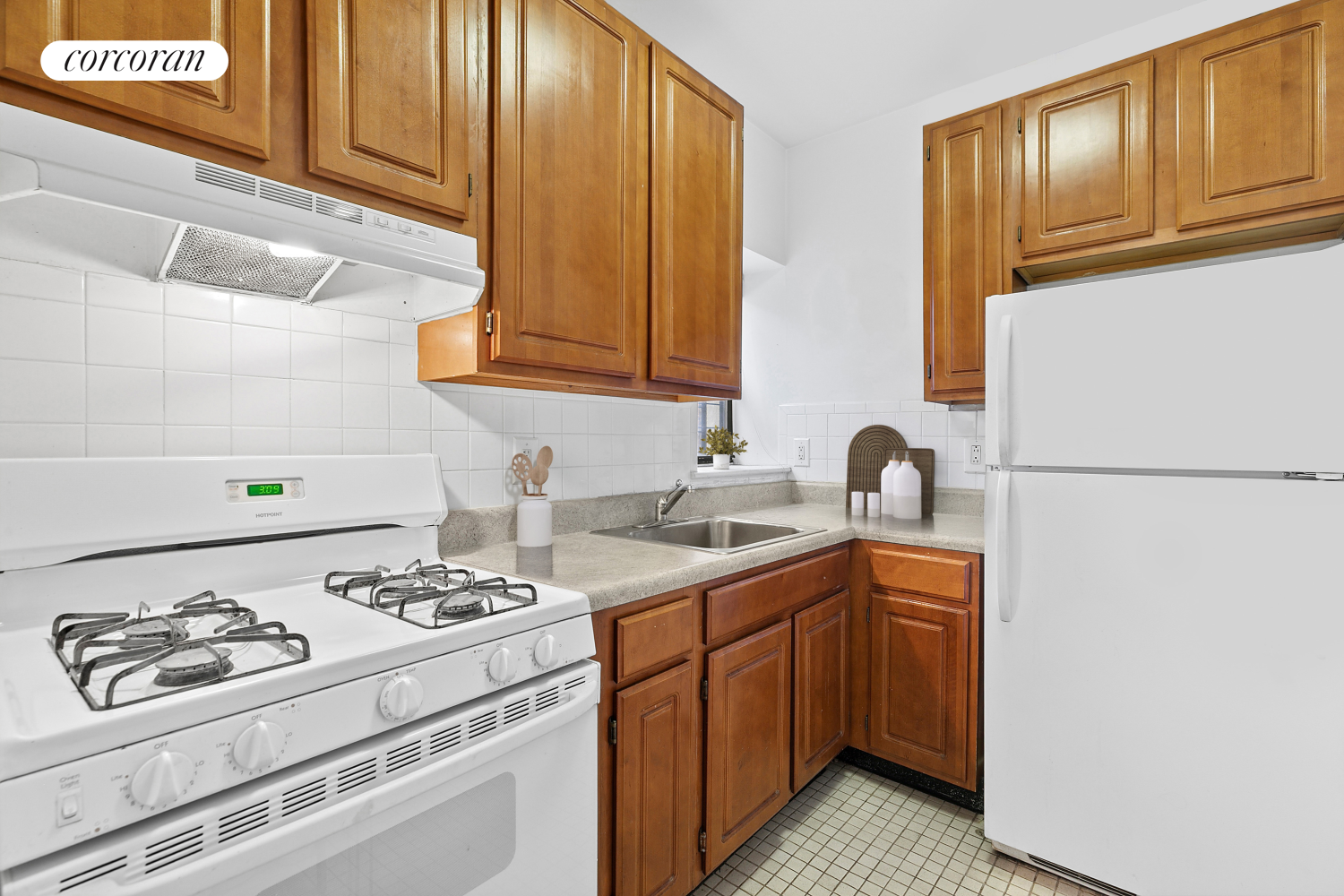248 East 3rd Street, Unit 3B Manhattan, NY 10009 - Photo 2 of 11 a kitchen with a sink cabinets and appliances