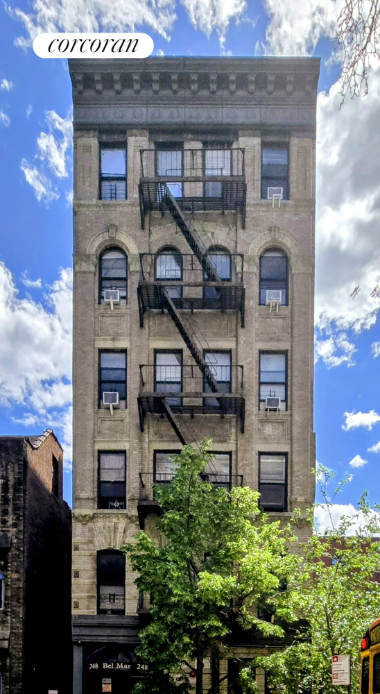 248 East 3rd Street, Unit 3B Manhattan, NY 10009 - Photo 5 of 11 a front view of a house with a yard