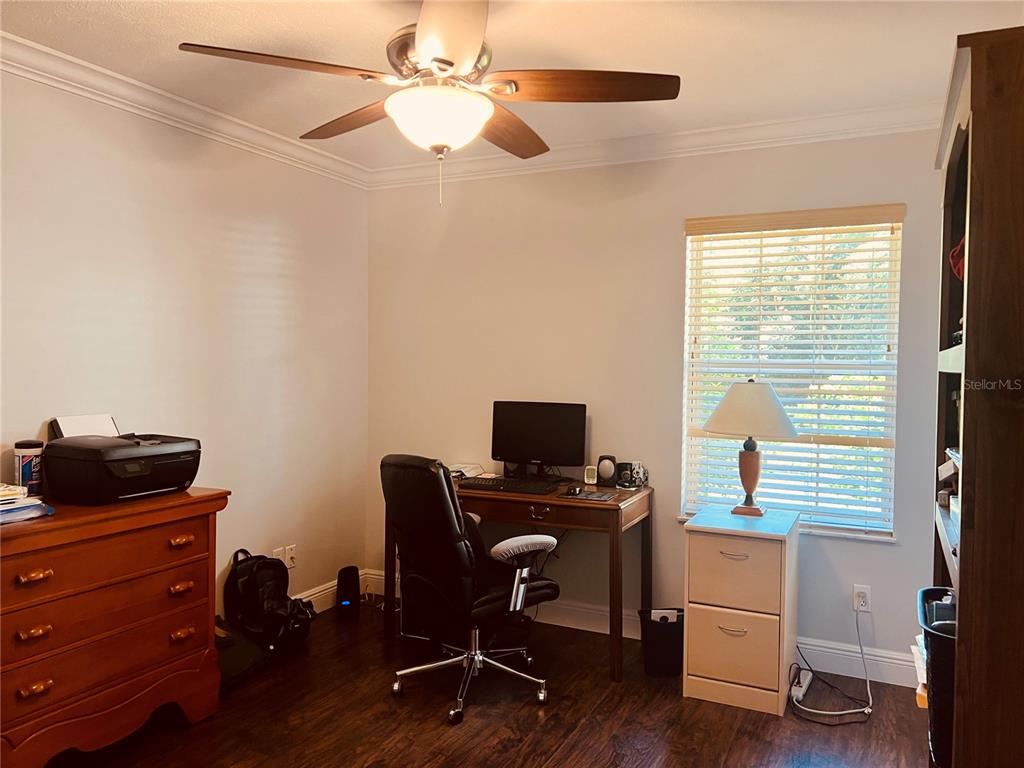 7961 West Riverbend Road Crystal River, FL 34428 - Photo 30 of 40 a view of a workspace with furniture and a window
