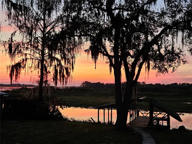front view of a house next to a yard