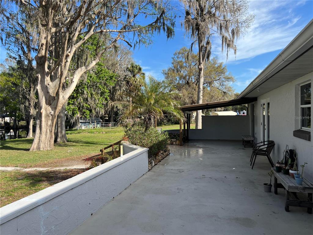 7961 West Riverbend Road Crystal River, FL 34428 - Photo 5 of 40 a view of a house with a yard