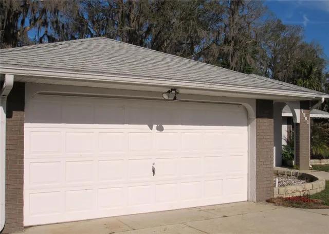 a view of a lake with houses in the background