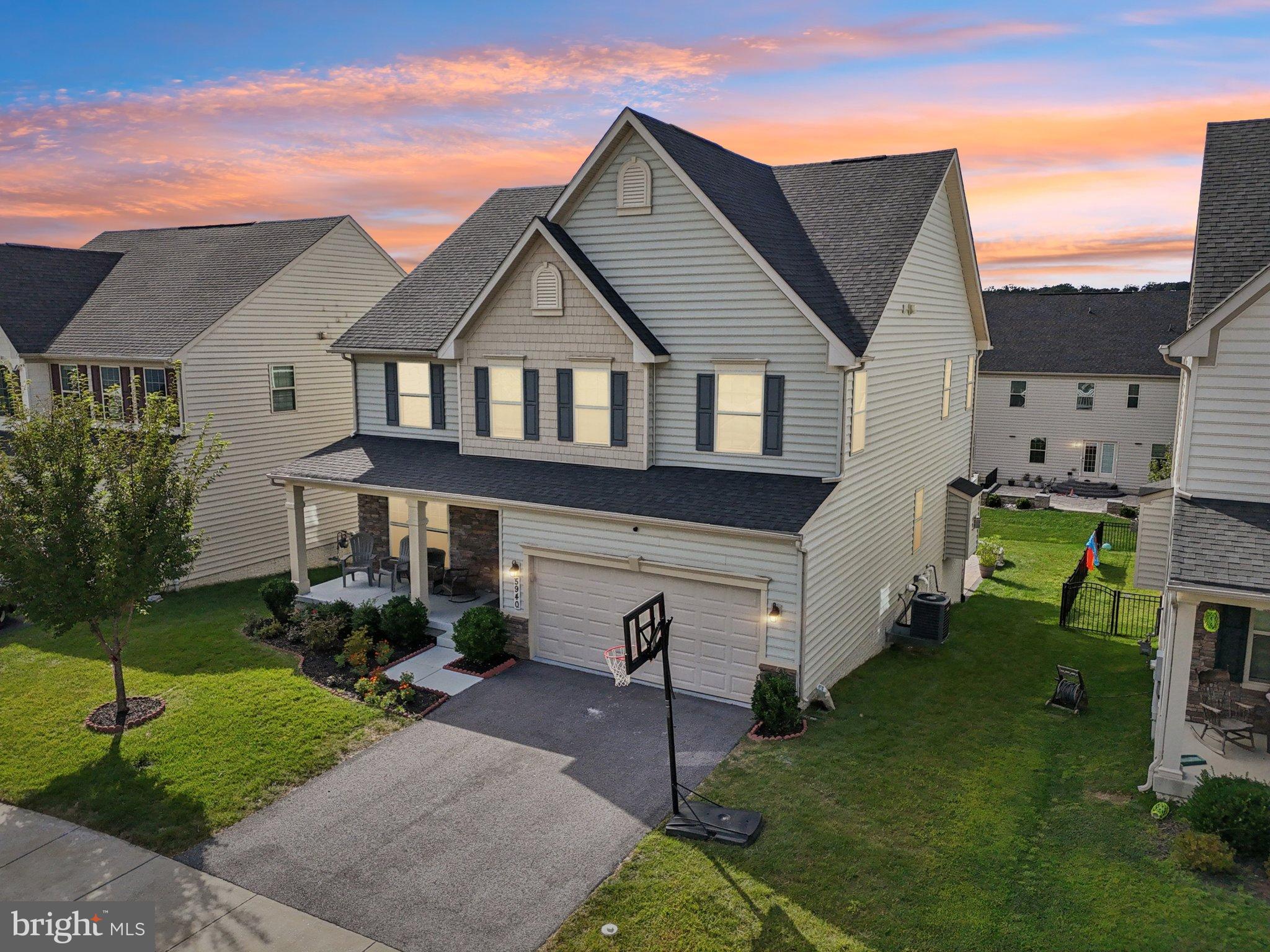 5940 Duvel Street Ijamsville, MD 21754 - Photo 1 of 62 a front view of a house with a yard