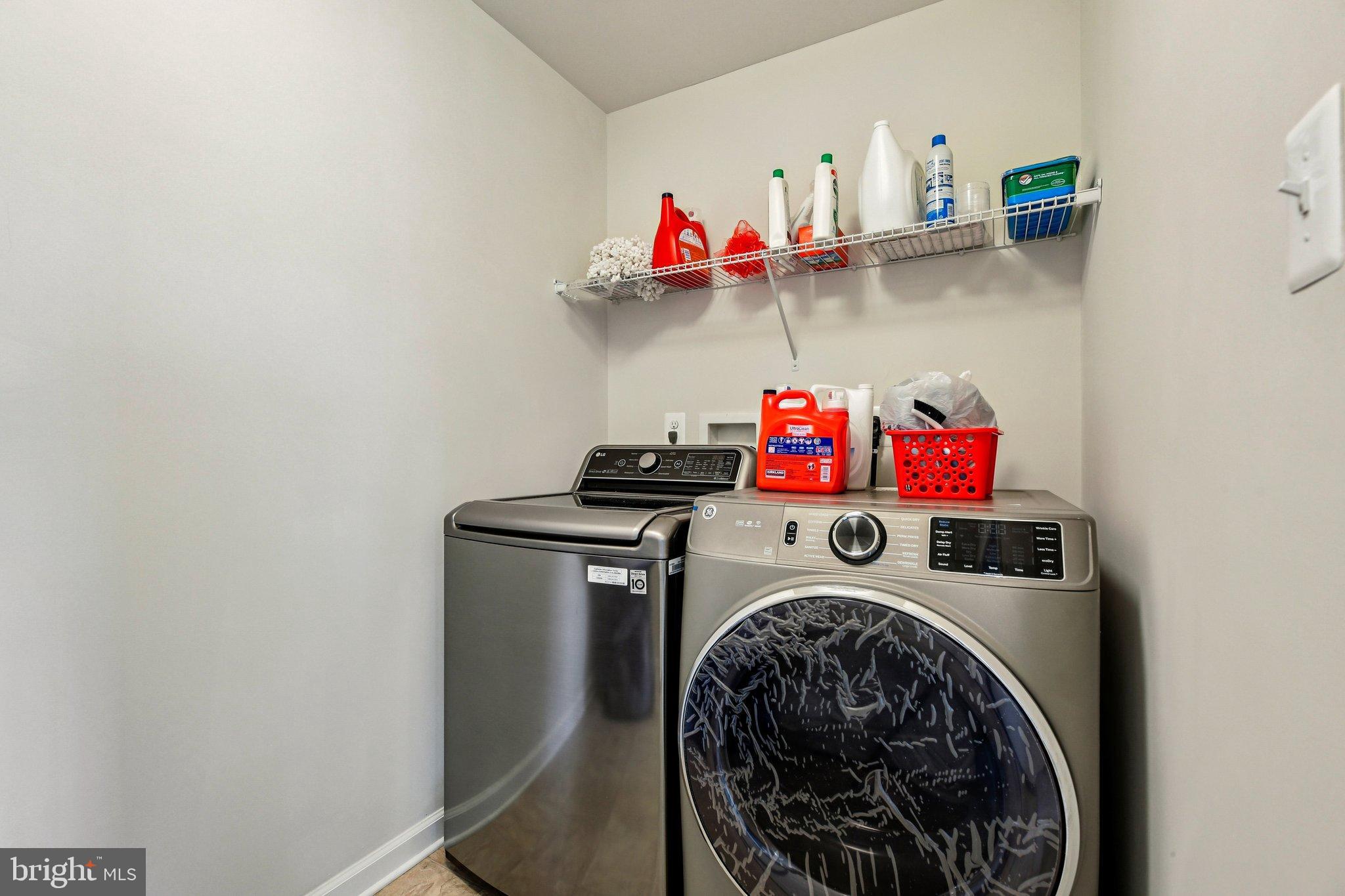 5940 Duvel Street Ijamsville, MD 21754 - Photo 25 of 62 a utility room with dryer and washer