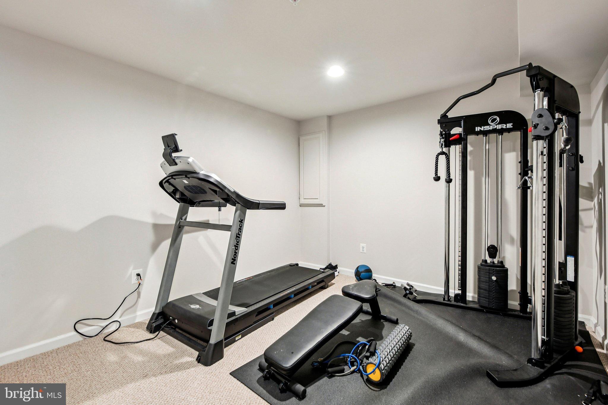5940 Duvel Street Ijamsville, MD 21754 - Photo 40 of 62 a room with gym equipment