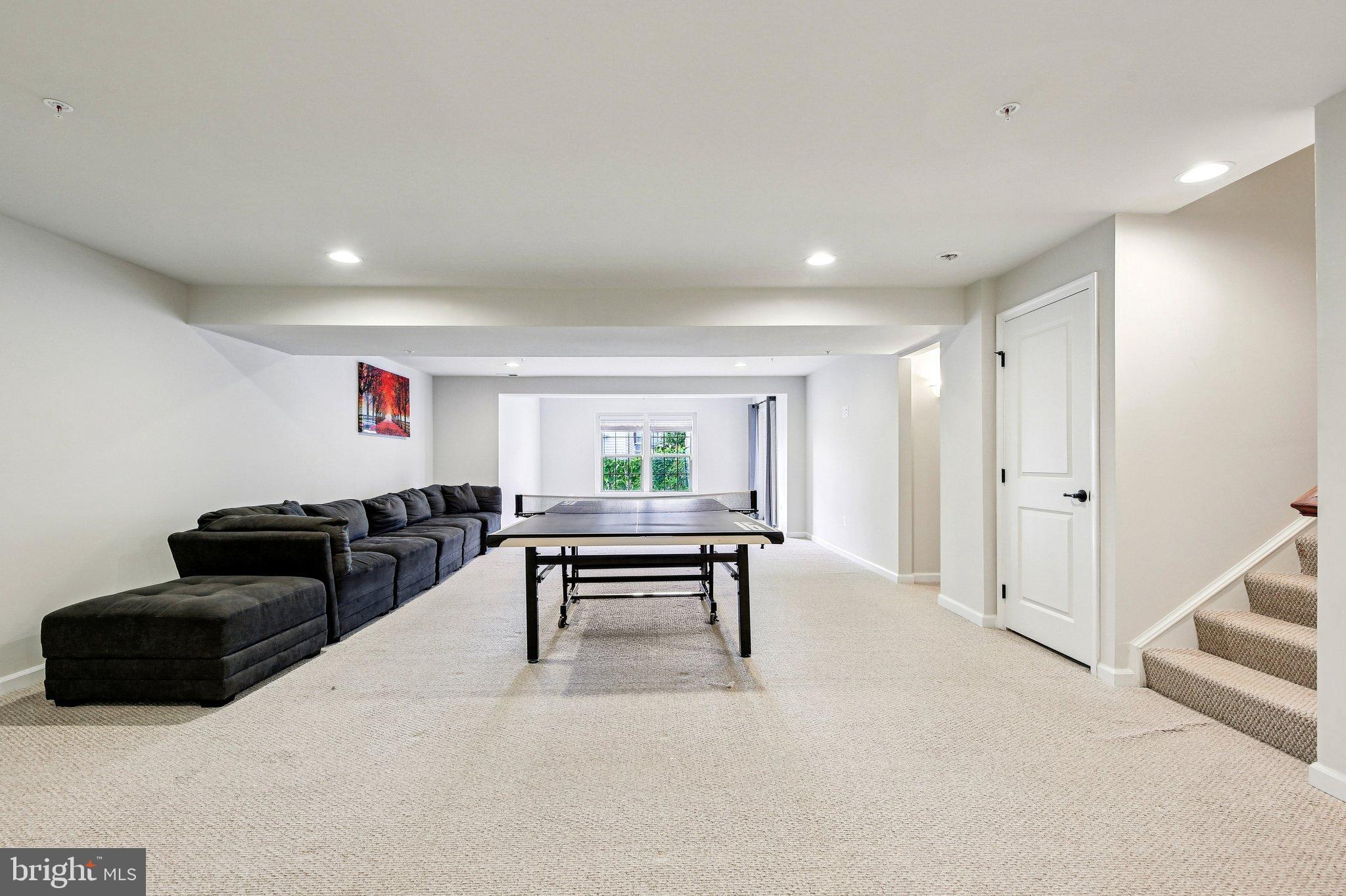 5940 Duvel Street Ijamsville, MD 21754 - Photo 41 of 62 a living room with furniture and a wooden floor
