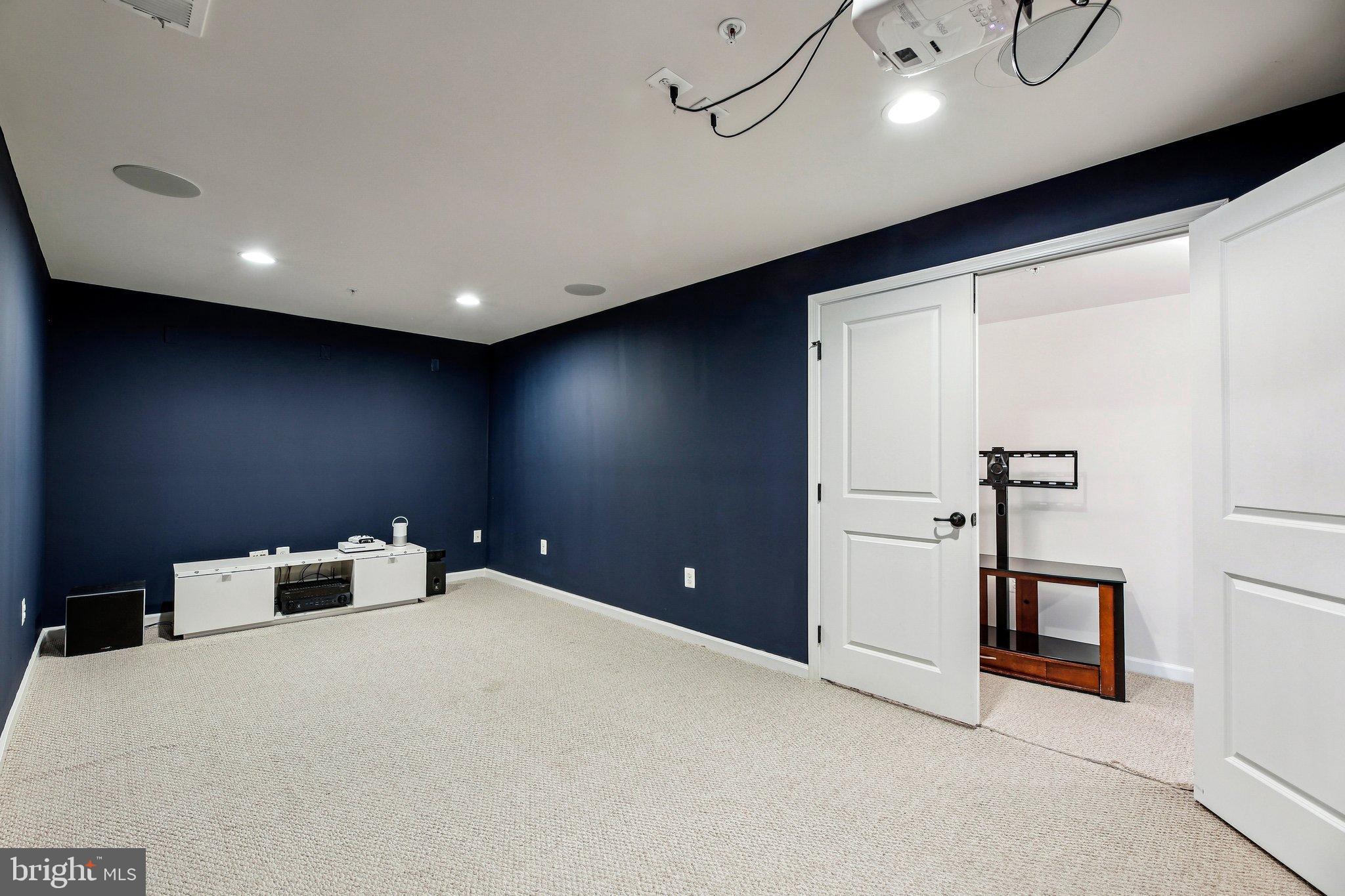 5940 Duvel Street Ijamsville, MD 21754 - Photo 43 of 62 a bedroom with a bed and cabinets