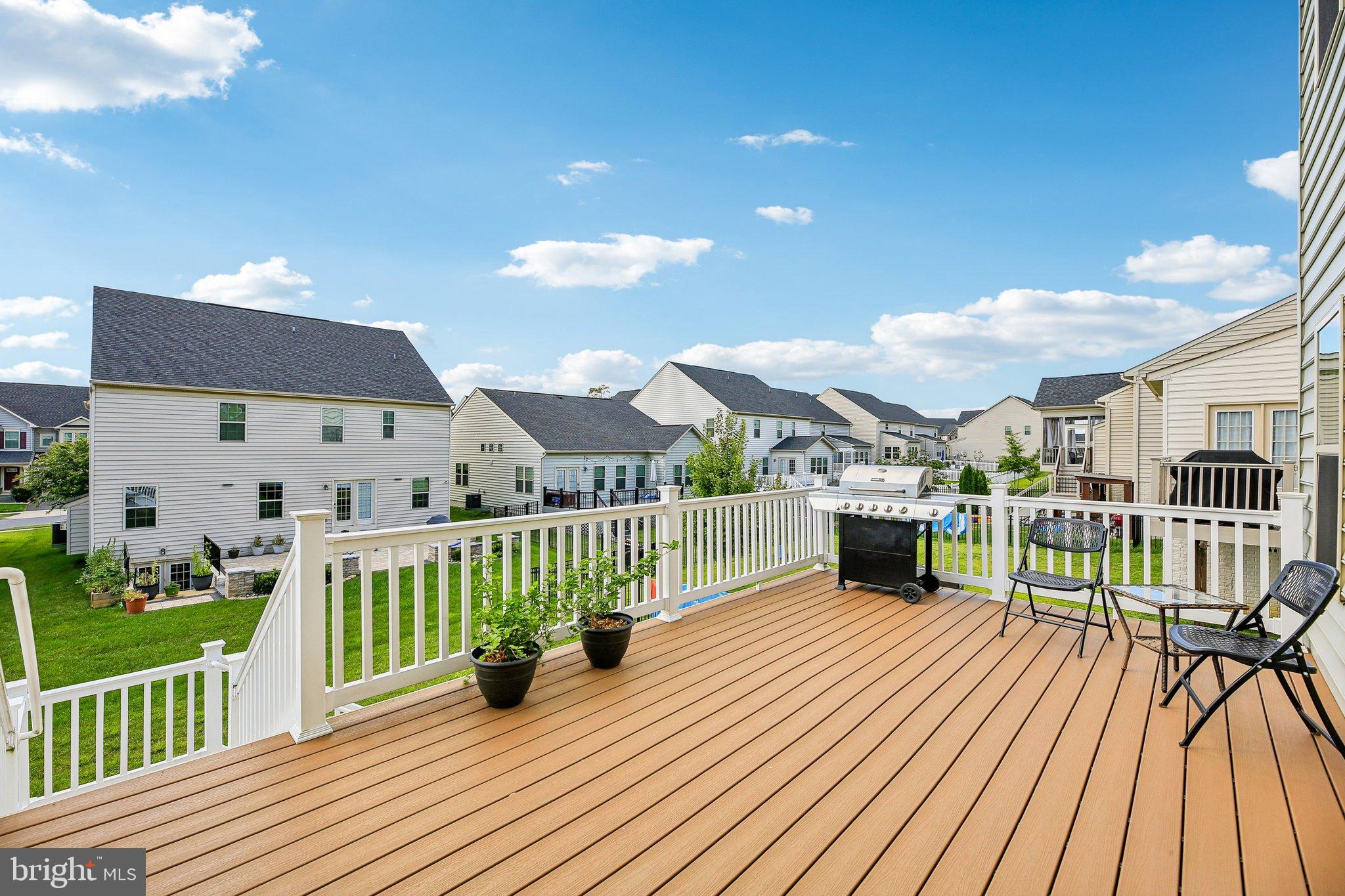 5940 Duvel Street Ijamsville, MD 21754 - Photo 50 of 62 a view of a house with a deck