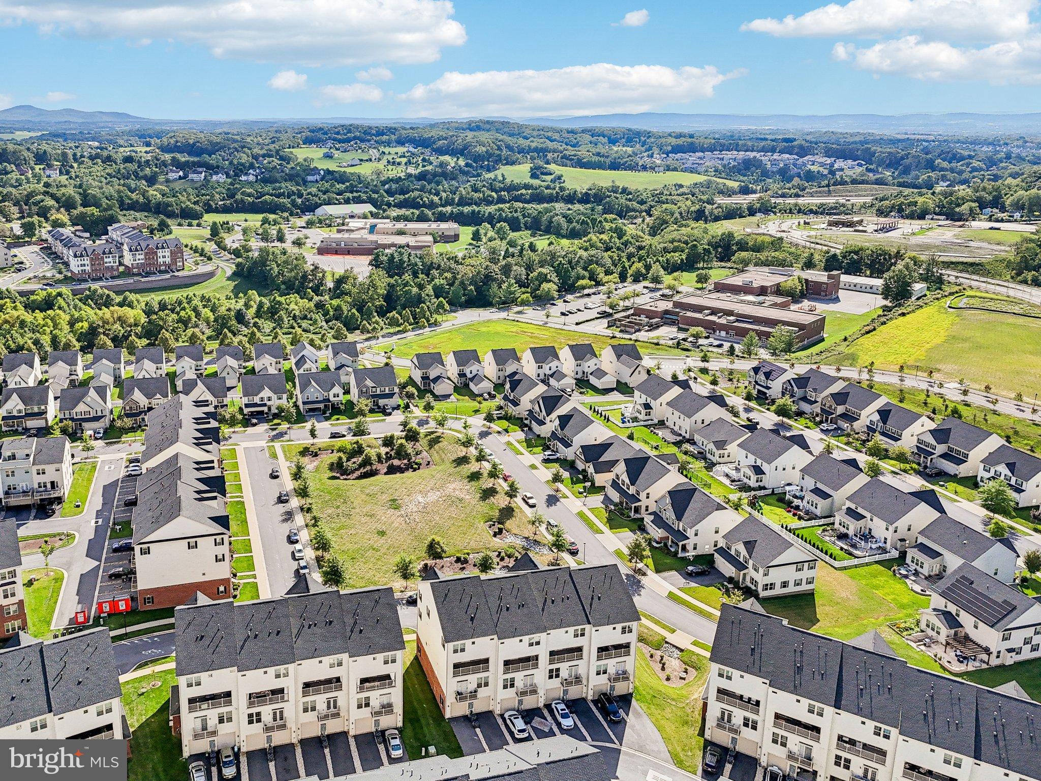 5940 Duvel Street Ijamsville, MD 21754 - Photo 55 of 62 an aerial view of residential houses with outdoor space