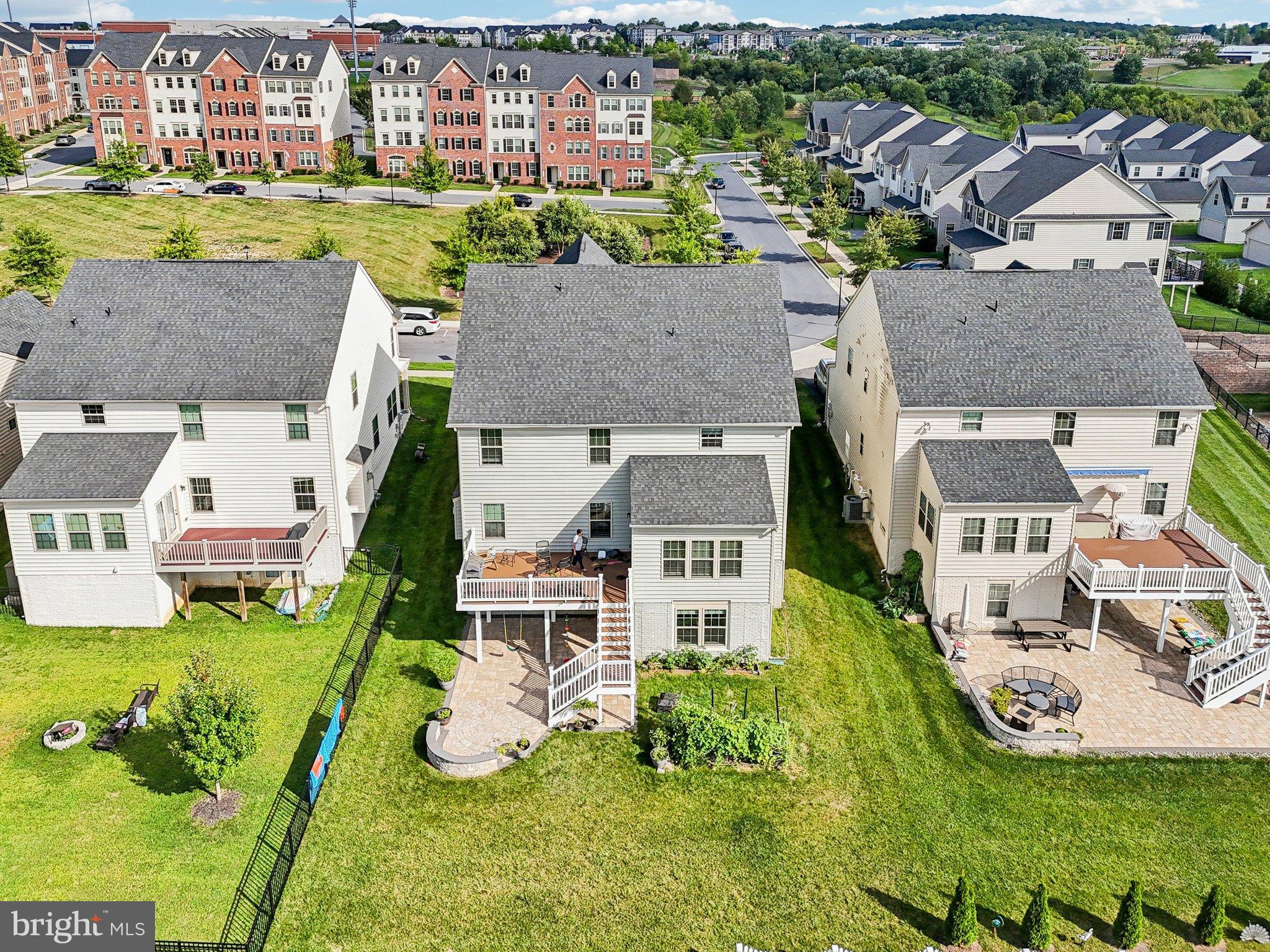 5940 Duvel Street Ijamsville, MD 21754 - Photo 57 of 62 an aerial view of residential houses with outdoor space and parking