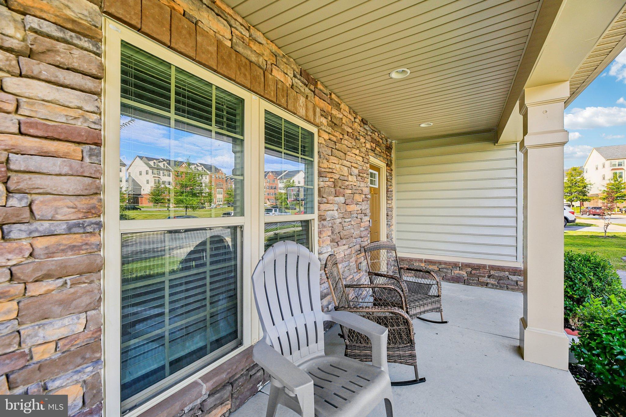 5940 Duvel Street Ijamsville, MD 21754 - Photo 6 of 62 a view of a chair and tables in the balcony