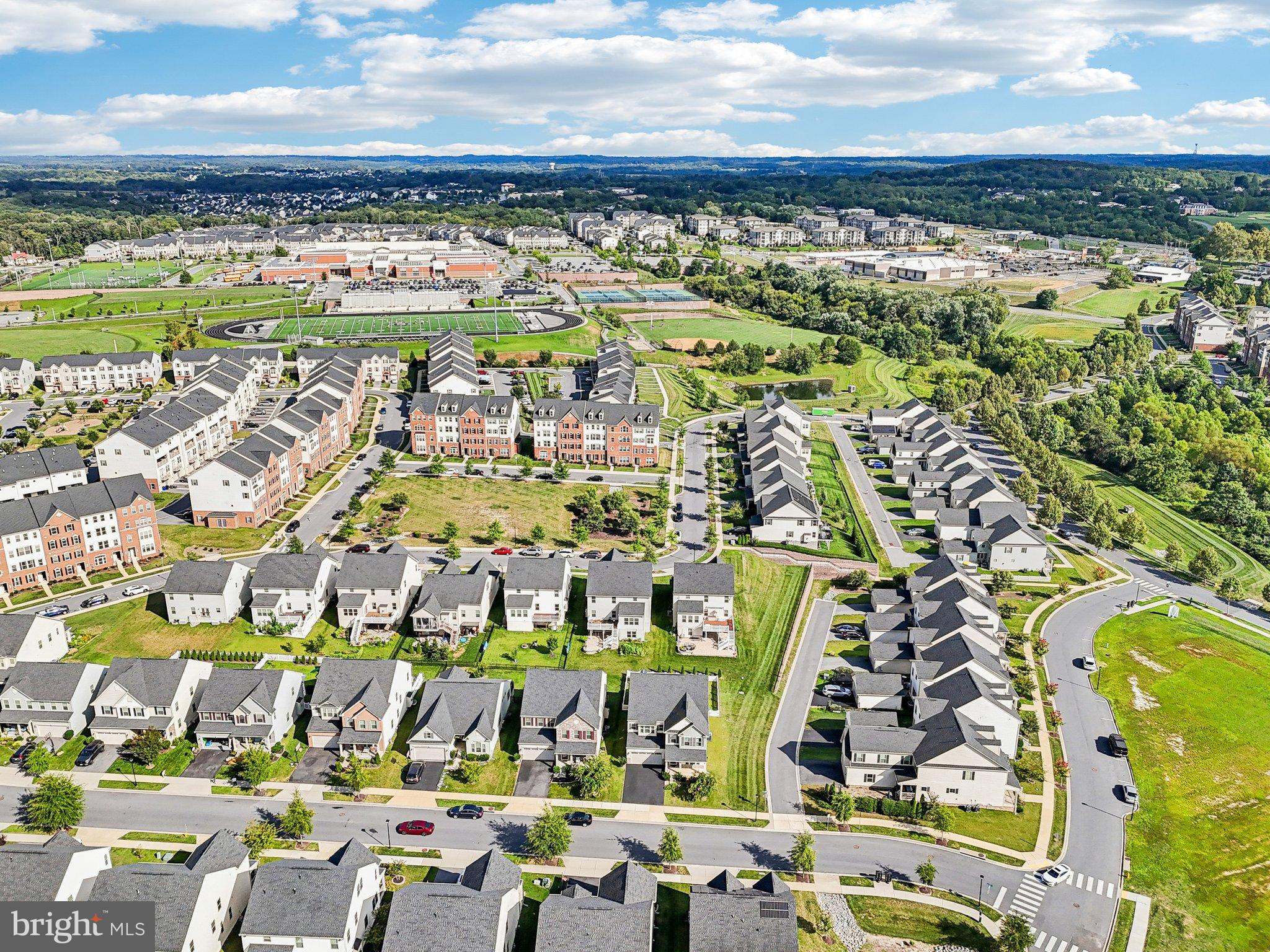 5940 Duvel Street Ijamsville, MD 21754 - Photo 61 of 62 Expansive suburban landscape under blue skies.