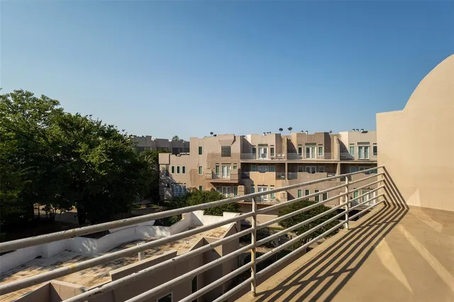 a view of balcony with furniture